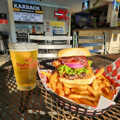 Burger and fries with a Budweiser draft beer